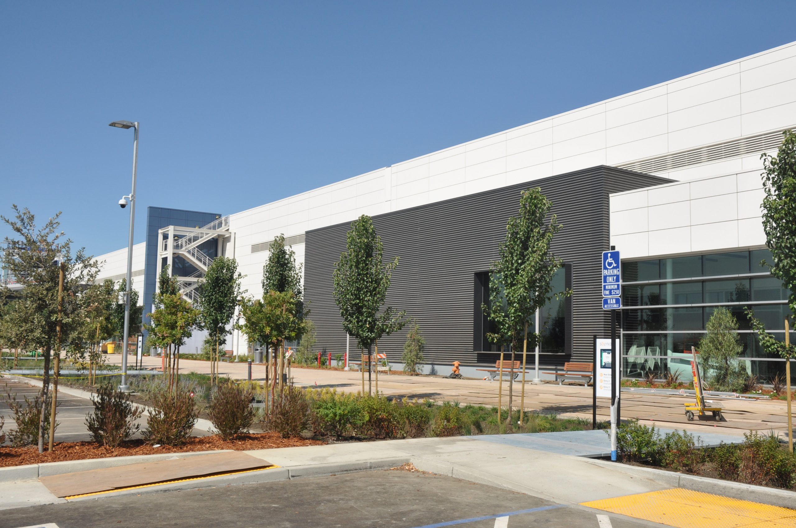 a building with trees in front