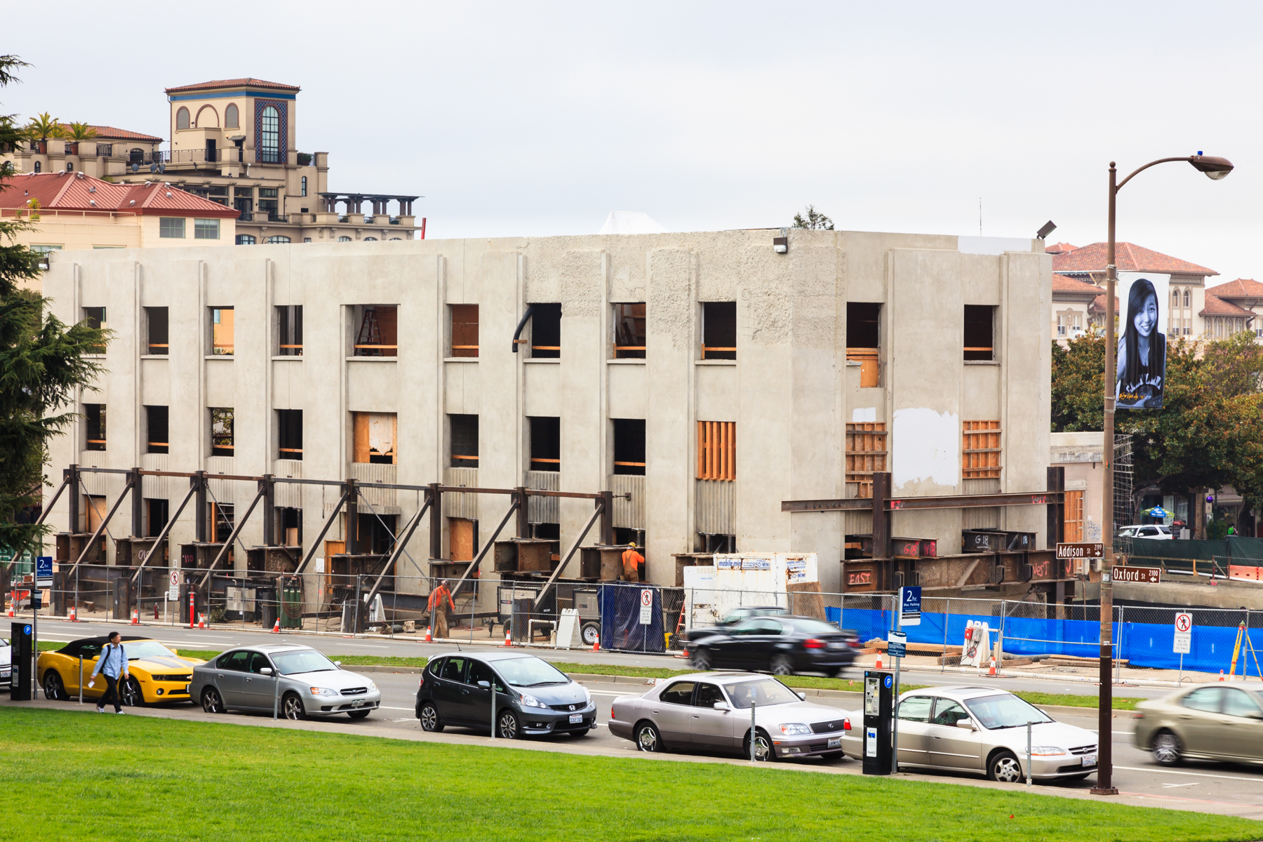 a building with cars parked in front