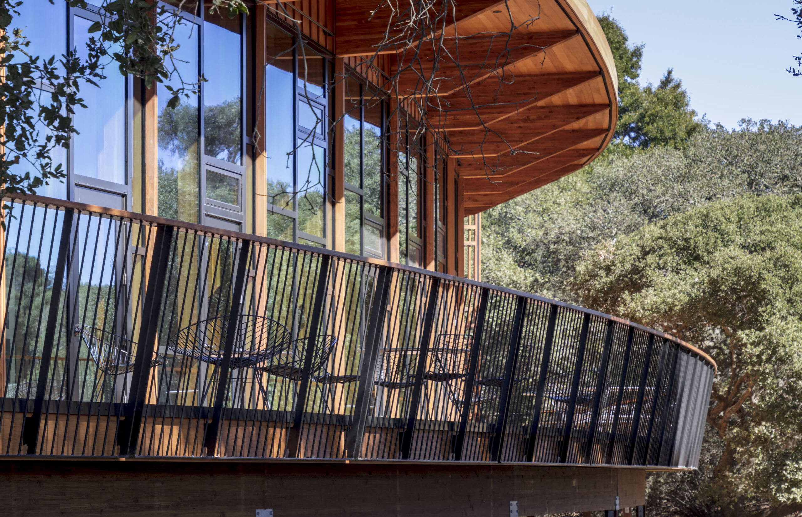 a wooden balcony with a railing