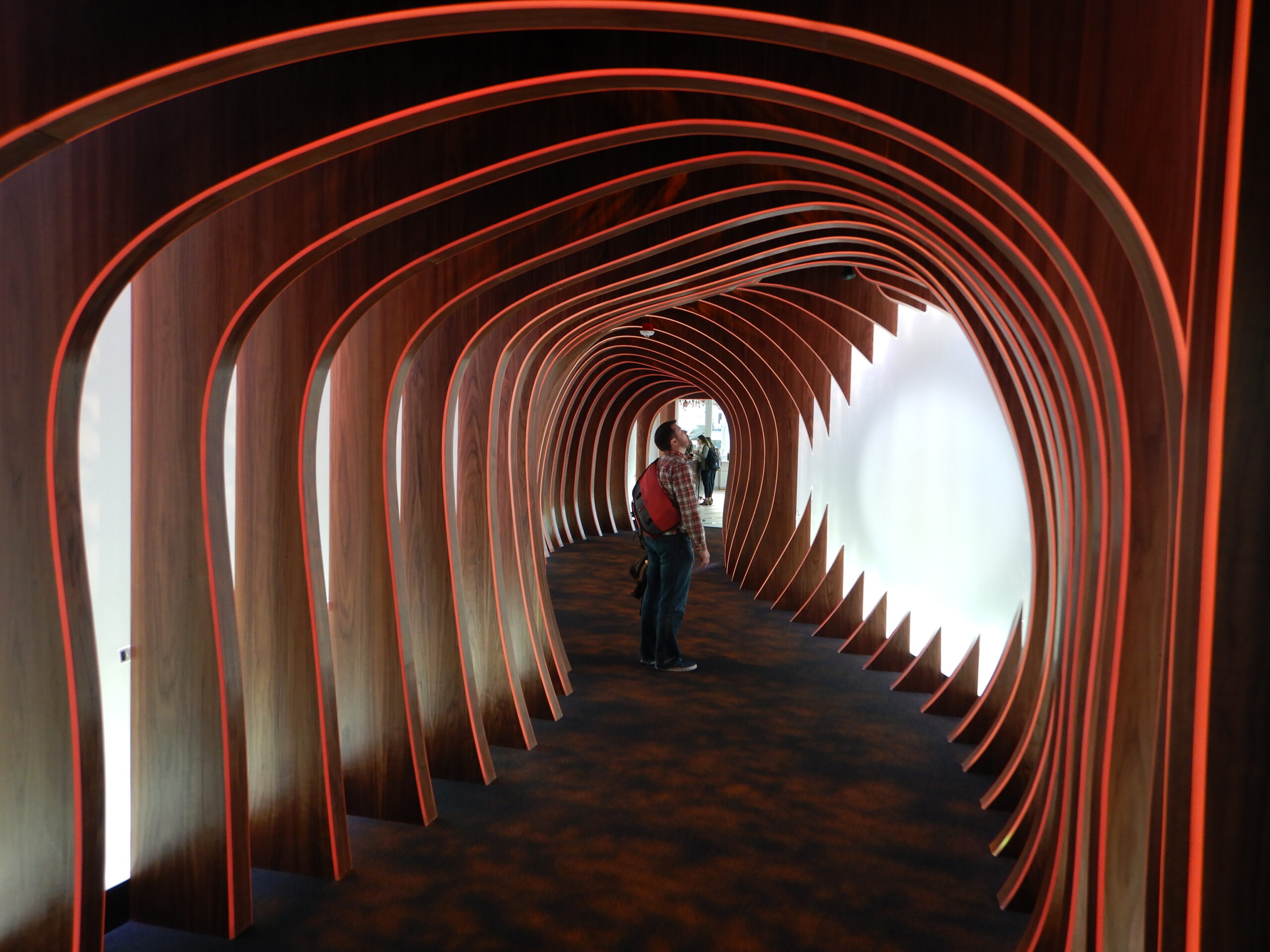 a person standing in a tunnel