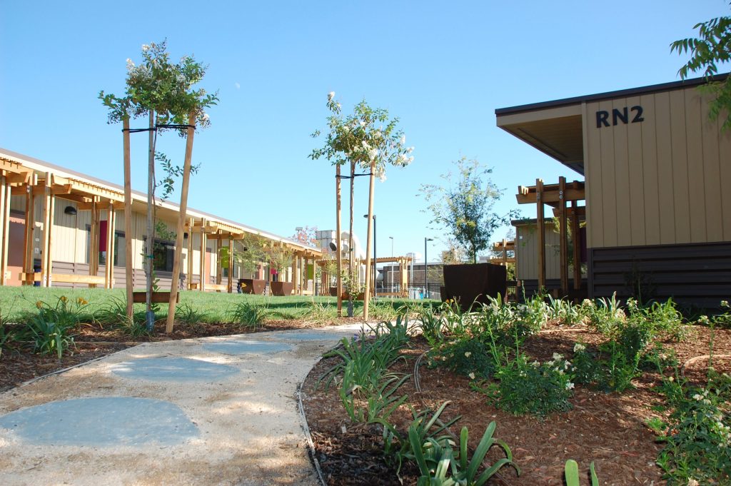 a building with a tree in the front