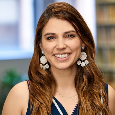 a woman smiling for the camera