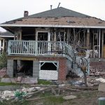 a heavily damaged house