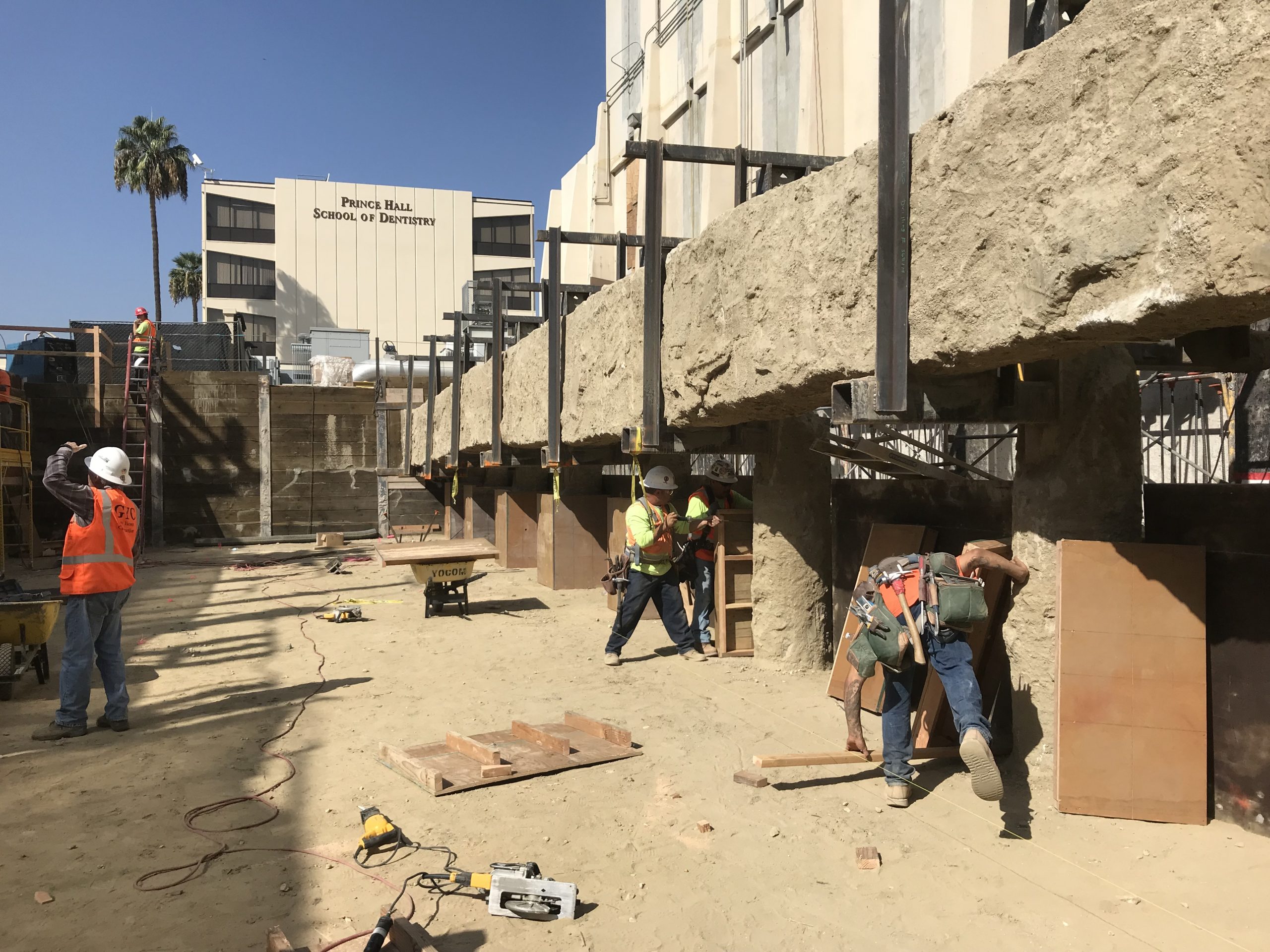 a group of people working on a building