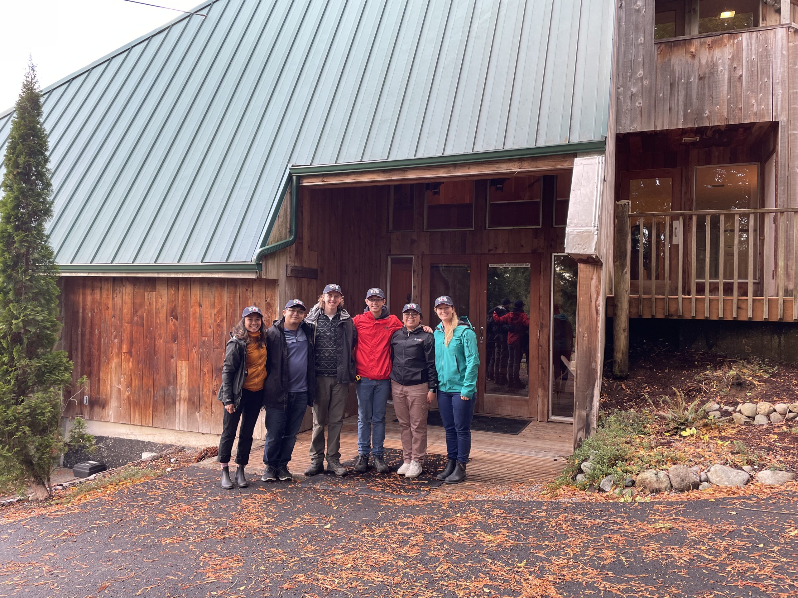 a group of people standing outside a building