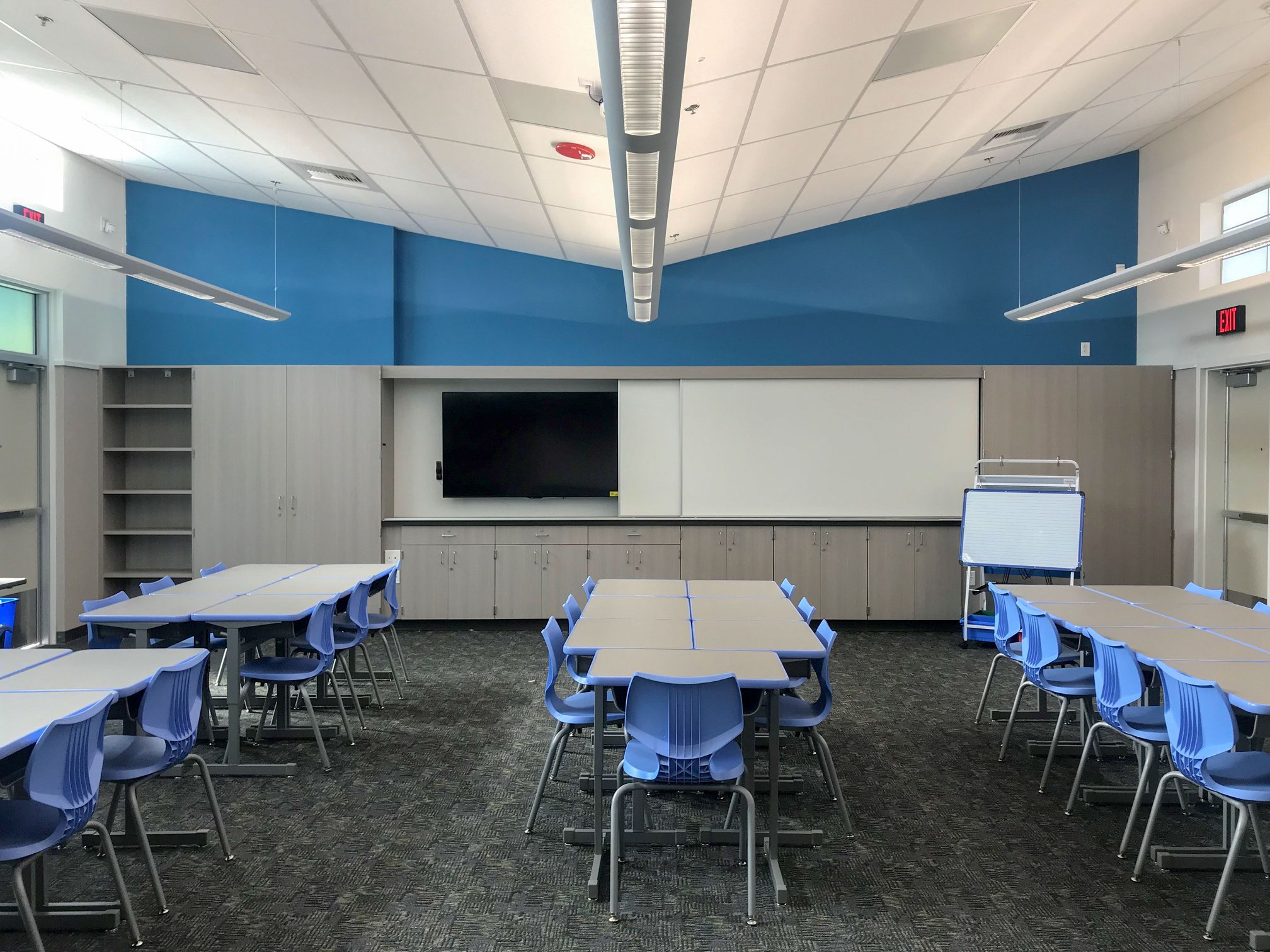 a room with tables and chairs