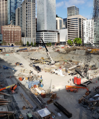 a construction site with cranes