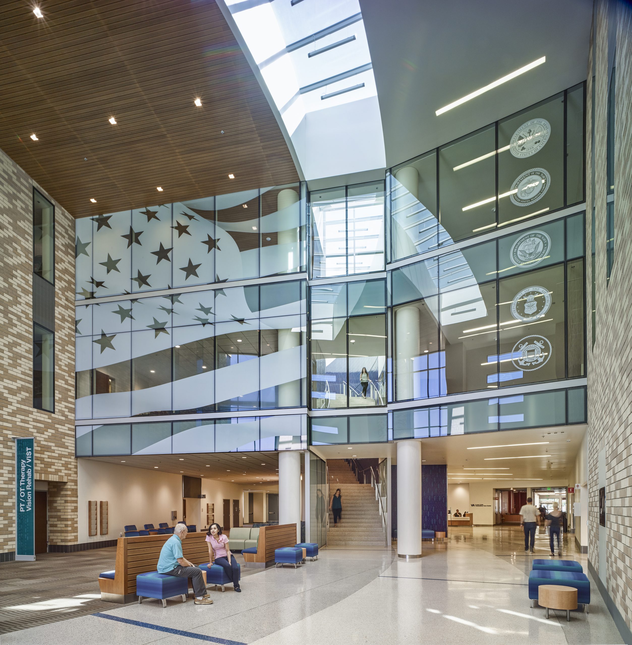 people sitting in a large building