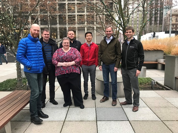 a group of people posing for a photo